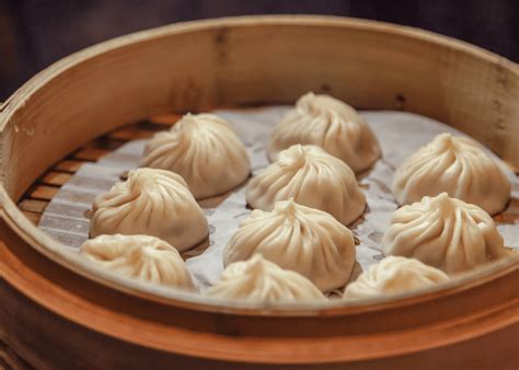  Xiao Long Bao: Descubra os Bicos de Dragão Vaporosos e Saborosos da Culinária de Pequim!